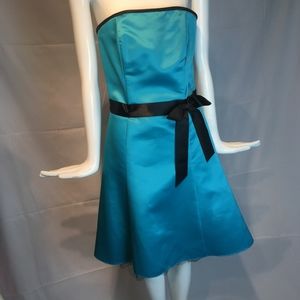 strapless belted prom dress by Gunne Sax